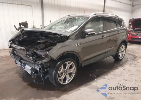 2019 Ford Escape Titanium z USA, uszkodzony, nr VIN 1FMCU9J98KUC26524